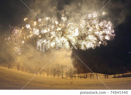 Winter fireworks display that colors the night sky Winter fireworks display that colors the night sky 74845340