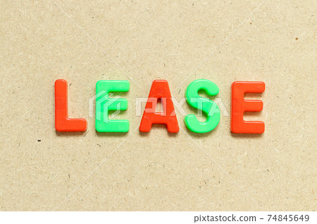 Color alphabet letter with word lease on wood background 74845649