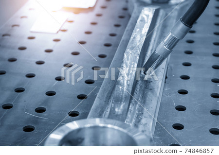 The laser welding machine control by robotic system.  74846857