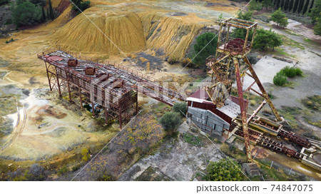 Rusty machinery at the old copper mine, view from above. Rusty machinery at the old copper mine, view from above. 74847075
