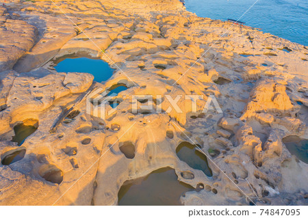 Aerial view of Sam Phan Bok, Ubon Ratchathani, Thailand. Dry rock reef in the Mekong River. Nature landscape background. Grand Canyon of Thailand. 74847095