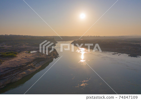 Aerial view of Sam Phan Bok, Ubon Ratchathani, Thailand. Dry rock reef in the Mekong River. Nature landscape background. Grand Canyon of Thailand. 74847109
