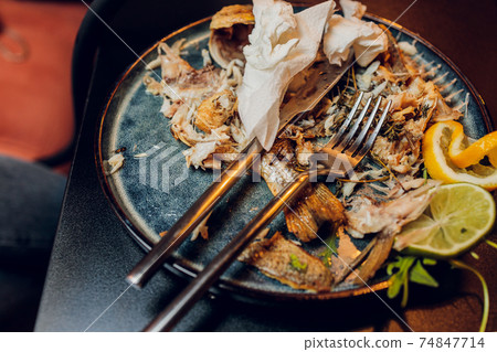 a half eaten plate of food. Everyone's got to eat. a half eaten plate of food. Everyone's got to eat. 74847714