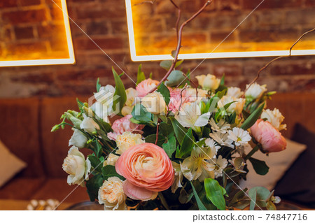 Bunch of different flowers close up background. Bunch of different flowers close up background. 74847716