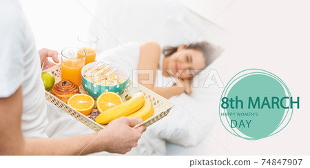 Portrait of young beautiful girl waiting for holiday breakfast. Postcard. Portrait of young beautiful girl waiting for holiday breakfast. Postcard. 74847907