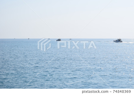 Luxury yacht sailing in open waters 74848369