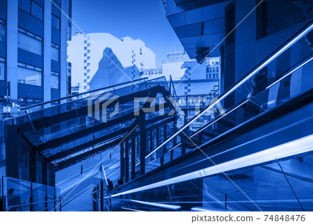 Urban city image Blue building looking up at the future city Urban city image Blue building looking up at the future city 74848476