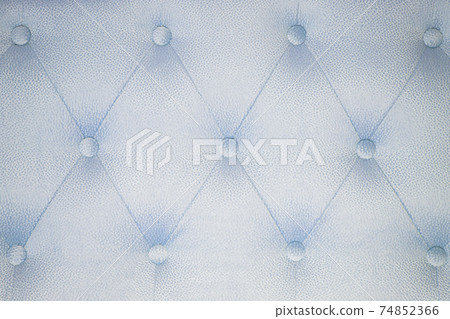 Fabric background of a sofa or bed close-up. fabric pattern. Abstract background for furniture. Background photos of upholstered furniture Fabric background of a sofa or bed close-up. fabric pattern. Abstract background for furniture. Background photos of upholstered furniture 74852366