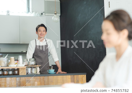 Cafe male staff Cafe male staff 74855782