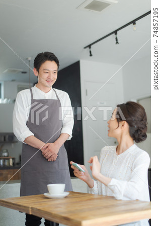 Cafe male staff Cafe male staff 74857195