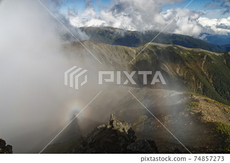 Brocken specter and Mt. Komori that appeared on the summit of Mt. Shiomi in the Southern Alps 74857273