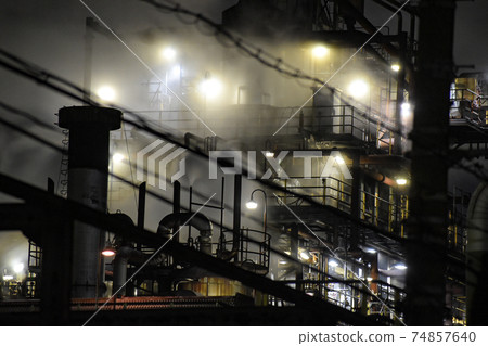 Smoke-covered night factory Smoke-covered night factory 74857640