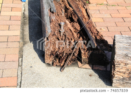 Decayed wooden bench 74857839
