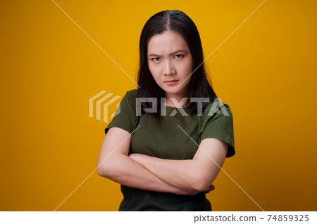 Asian woman standing and angry. 74859325