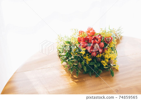 Bouquet on the table 74859565