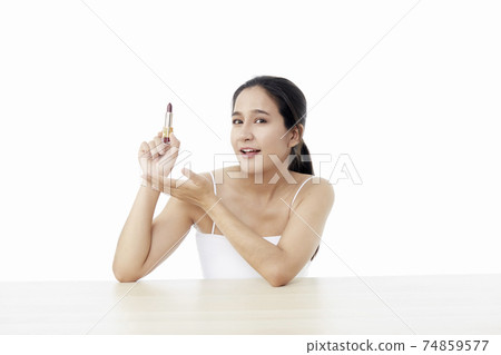 Beautiful woman with lipstick. Beautiful Young Asian Woman with Clean Fresh Skin. Face care, Facial treatment, Cosmetology, beauty, and healthy skin and cosmetic ideas concept Beautiful woman with lipstick. Beautiful Young Asian Woman with Clean Fresh Skin. Face care, Facial treatment, Cosmetology, beauty, and healthy skin and cosmetic ideas concept 74859577