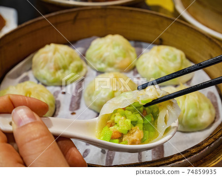 Close up shot of delicious steamed soup dumpling 74859935