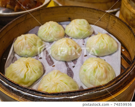 Close up shot of delicious steamed soup dumpling Close up shot of delicious steamed soup dumpling 74859936