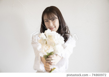 Portrait of woman with flowers Portrait of woman with flowers 74860972