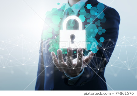 Internet security. A businessman who checks the Internet and controls an encryption system. 74861570