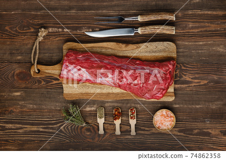 Overhead view of raw beef tenderloin roast Overhead view of raw beef tenderloin roast 74862358