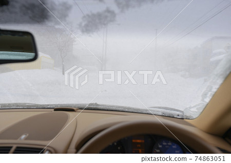 Whiteout seen from the driver's seat of the car 74863051