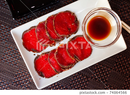 Thinly sliced raw beef sashimi Thinly sliced raw beef sashimi 74864566