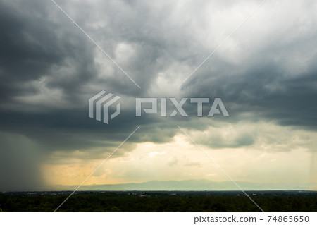 Storm clouds with the rain. Nature Environment Dark huge cloud sky black stormy cloud Storm clouds with the rain. Nature Environment Dark huge cloud sky black stormy cloud 74865650