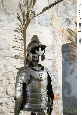 Gallery of knight's armor. Knight's iron armor in the museum Gallery of knight's armor. Knight's iron armor in the museum 74866489