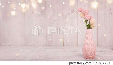 Flowers composition for Valentine's, Mother's or Women's Day. Pink flowers on old white wooden 74867751