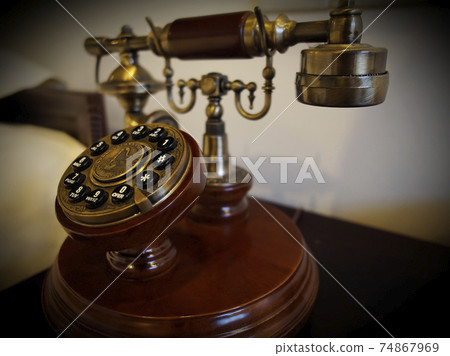 Old-fashioned phone in the guest room Old-fashioned phone in the guest room 74867969