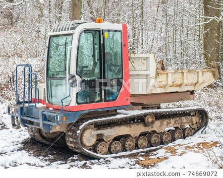 with a steel body for transporting stones, soil or sand over difficult terrain. with a steel body for transporting stones, soil or sand over difficult terrain. 74869072