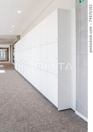 Storage cupboards along the wall 74870162