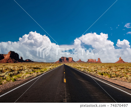 Empty scenic highway in Monument Valley 74870497