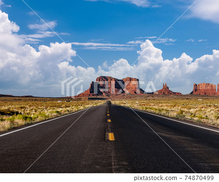 Empty scenic highway in Monument Valley 74870499