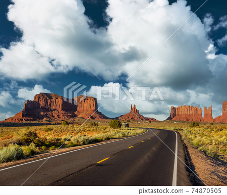 Empty scenic highway in Monument Valley 74870505