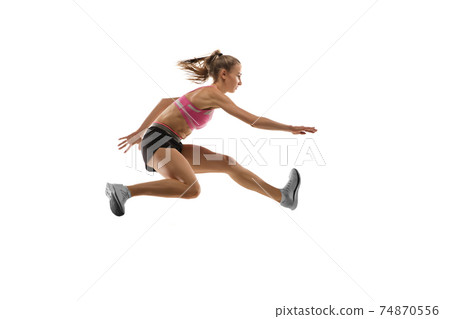 Caucasian professional female runner, athlete training isolated on white studio background. Copyspace for ad. Caucasian professional female runner, athlete training isolated on white studio background. Copyspace for ad. 74870556
