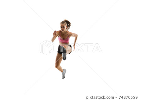 Caucasian professional female runner, athlete training isolated on white studio background. Copyspace for ad. Caucasian professional female runner, athlete training isolated on white studio background. Copyspace for ad. 74870559