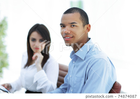 successful young business men with financial document successful young business men with financial document 74874087
