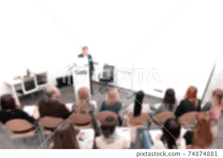 blurred image for the advertising text. photo with copy space. rear view.the project Manager conducts a meeting 74874881