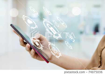 Female hand using mobile smart phone with icon graphic cyber security network 74875036