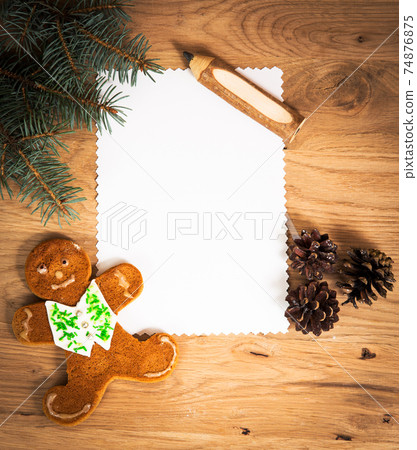 blank sheet of paper on the wooden floor with a pencil 74876875