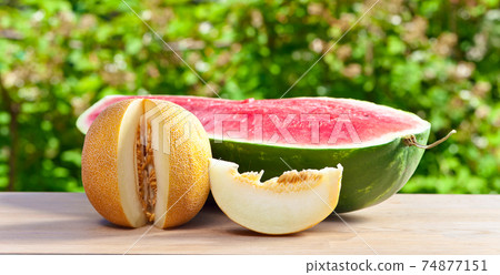 melon on table in garden 74877151