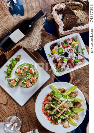 Beautifully decorated catering banquet table with different food snacks and appetizers 74877398