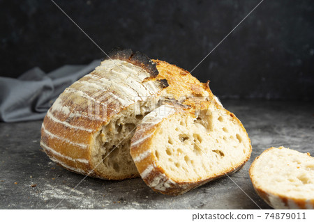 Sourdough rustic homemade healthy bread. Traditional bread, home baking concept. 74879011