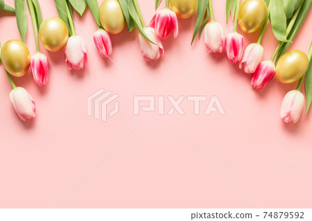 Easter greeting card with tulips, eggs on pink . 74879592