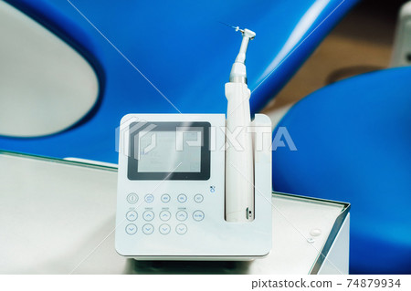 dental equipment in the dentist's office for root canal treatment. Close-up, endomotor 74879934