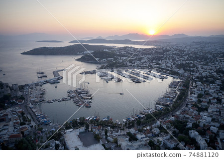 Aerial view of resort town Bodrum at sunset. Aerial view of resort town Bodrum at sunset. 74881120