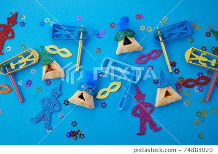 Purim celebration concept. Jewish carnival background. Top view. Flat lay 74883020