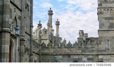 walls and towers of the historic palace stylized as a medieval castle walls and towers of the historic palace stylized as a medieval castle 74883046